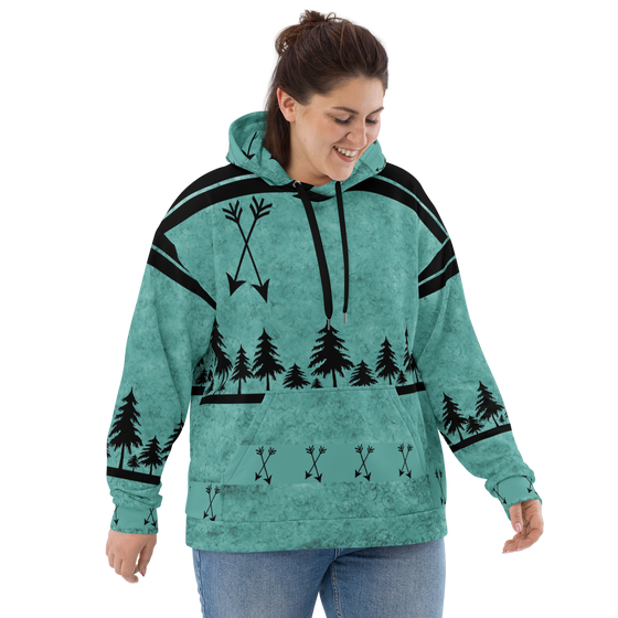 Plus size woman wearing a teal arrow hoodie with a bowhunting huntress theme and it has arrows and trees on it looking down