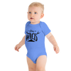 little boy in a blue onesie one piece in blue with the stay wild antler logo on it