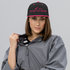 Woman wearing River to Ridge hot pink and black flatbill hat 