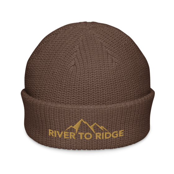 Product mockup of a fisherman's style skull cap beanie from River to Ridge Clothing Brand with the mountain logo on it