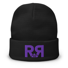  Product mockup of a River to Ridge Logo Beanie in black with purple stitching R to R