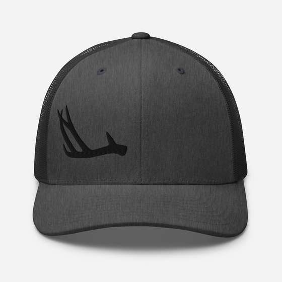 Product mockup of an antler logo shed hunting hat from River to Ridge Clothing company with a deer antler stitched on it on one side of the front