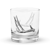 Product mockup of a whiskey rocks glass with deer antler shed hunting logo  on it from River to Ridge Brand