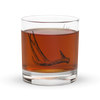 Product mockup of a whiskey rocks glass with deer antler shed hunting logo  on it from River to Ridge Brand