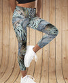 little girl wearing turkey feather leggings in a dance pose