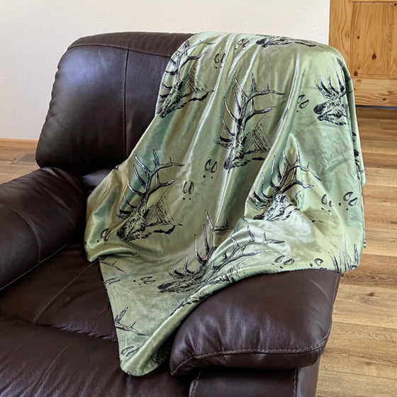 Elk Logo Throw Blanket from River to Ridge Clothing Brand, olive with elk and tracks pattern