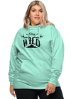 Plus Size woman in hoodie with stay wild logo in teal with antlers and mountains