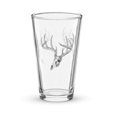  Product mockup of a pint beer glass with whietail deer skull logo from River to Ridge clothing brand