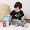 Childrens T shirt with elk logo on it from River To Ridge Clothing Brand, toddler playing with blocks