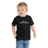 Little boy wearing a river to ridge brand logo t shirt in black