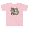 River to Ridge Clothing Brand Somewhere Over the Rainbow Toddler Trout Fishing T shirt with a woman fishing inside of a rainbow trout drawing. Pink