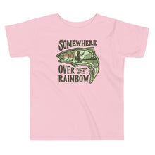  River to Ridge Clothing Brand Somewhere Over the Rainbow Toddler Trout Fishing T shirt with a woman fishing inside of a rainbow trout drawing. Pink