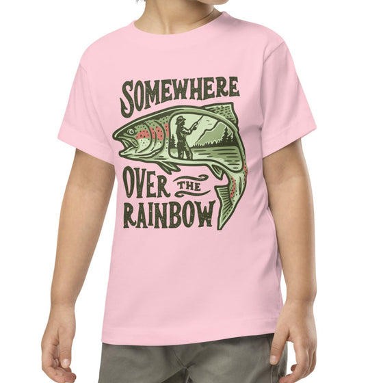 River to Ridge Clothing Brand Somewhere Over the Rainbow Toddler Trout Fishing T shirt with a woman fishing inside of a rainbow trout drawing. Pink