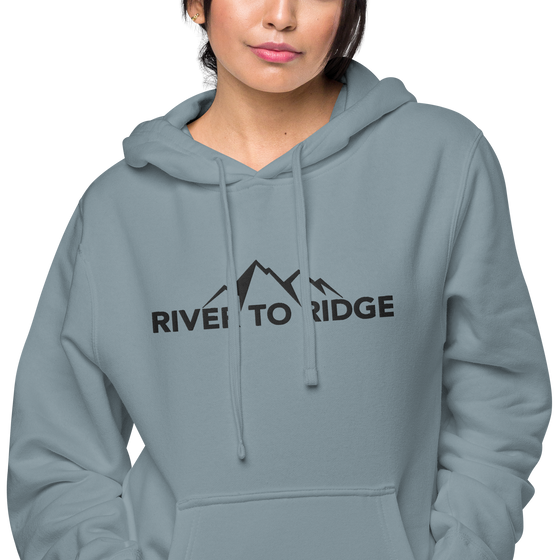 Indigo Blue Womens Hoodie with the River to Ridge Clothing Mountain Logo embroidered on the chest and cuff of sleeve.