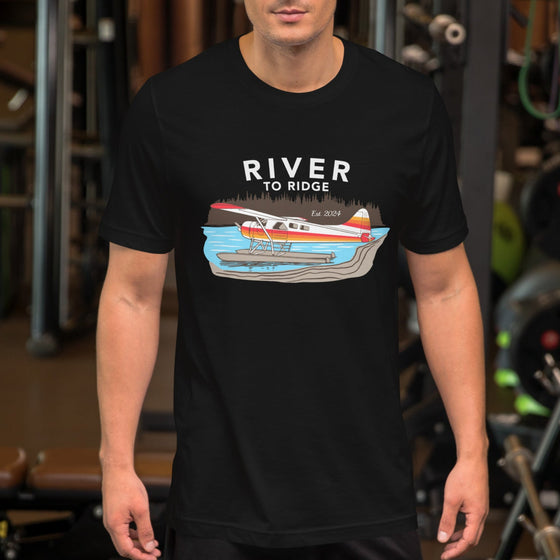 Product mockup of Alaska bush plane Backcountry taxi t shirt from River to Ridge clothing in black