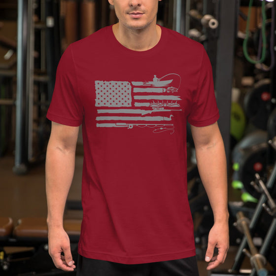 Product mockup of a River to Ridge Clothing brand Sportsmans Flag T shirt for Men, with the USA flag and a patriotic outdoor lifestyle theme in the stripes of fishing, hunting, antlers, bass, elk etc...