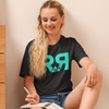 River to Ridge Logo T Shirt in teal and grey worn by a woman writing in her journal