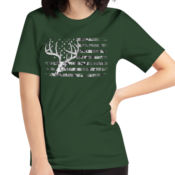 Womens Whitetail Flag T shirt from River to Ridge Clothing Brand, featuring a skull and antlers of a whitetail deer over a camo USA flag, patriotic 