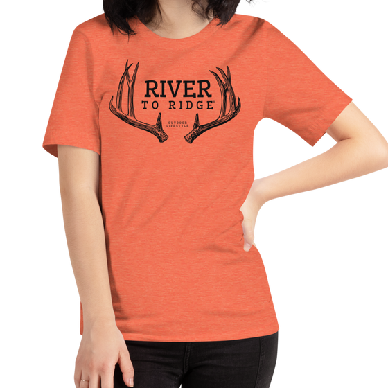 River to Ridge Clothing Brand Womens T shirt in Mule Deer Antler Logo in Heather Orange - close up photo of woman wearing the t shirt