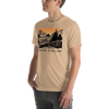 Men's T Shirt with graphic of a Jeep offroading in the mountains with the Words Adventure is Calling from River to Ridge Clothing brand worn by a young guy