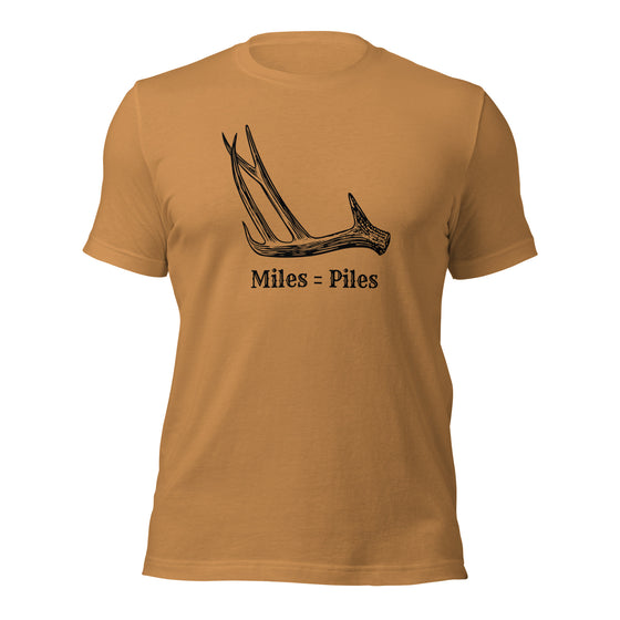 Product mockup of a Miles = Piles Shed Hunting T Shirt from River to Ridge Clothing Brand with a Deer Antler on it