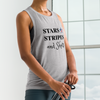 Stars Stripes and Shots Logo Womens Muscle Tank Top in grey on a model at the gym for River to Ridge Clothing Brand