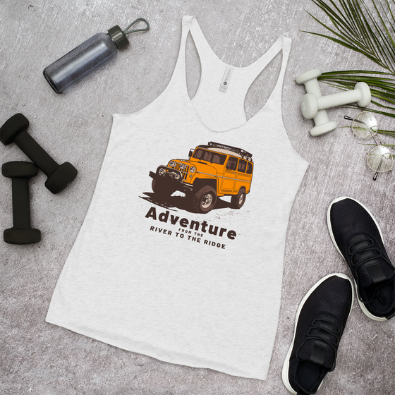 Womens Adventure tank top from River to Ridge Brand. Featuring a yellow land cruiser with big tires for offroading